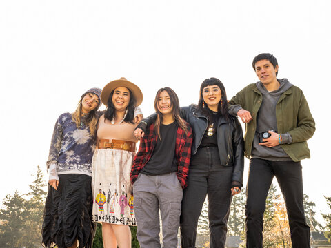 Young Indigenous friends hanging out outdoors