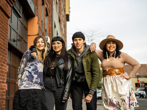 Young Indigenous friends walking outdoors