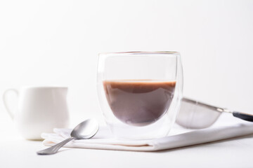 hot chocolate in a glass on a white background