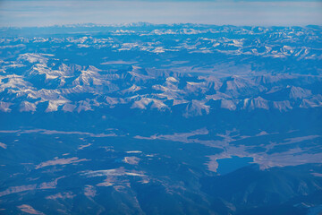 Aerial view of some snowy mountain around Colorado