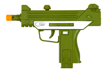Green toy submachine gun on a white background, isolated image - obrazy, fototapety, plakaty