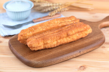 Chinese traditional breakfast fried dough sticks with tureen tea