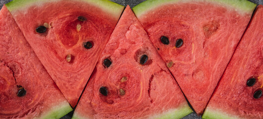 Fresh watermelon slices on the rustic background. Shot from above.