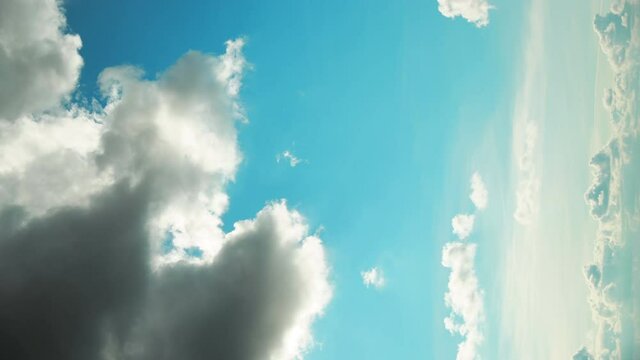 Light Cloudy Blue Sky With Fluffy Clouds. Natural Background 4K Time Lapse. Natural Sky Backdrop
