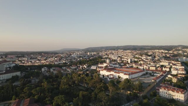 Aerial flying towards Coimbra Prision establishment Building, Cityscape Horizon