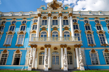 Fragment of the facade of Catherine Palace in Tsarskoe selo. Atlanteans hold cornice, a monument of Russian Baroque architecture of XVIII century, UNESCO heritage. Pushkin, Saint Petersburg, Russia