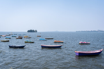 Naklejka na ściany i meble Boats in the upper lake at Bhopal which is also known as 'city of lakes'.
