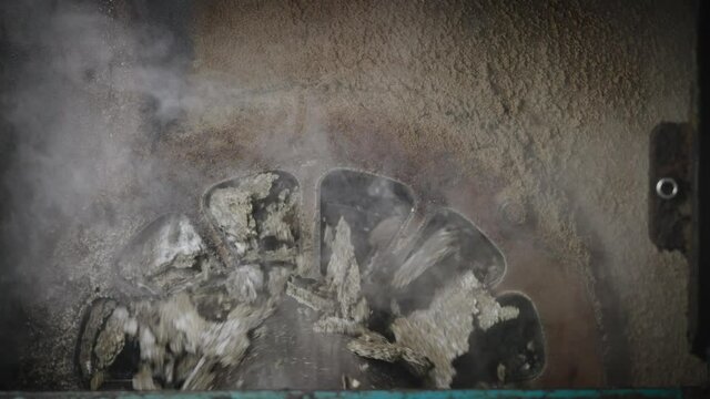 The press produces sunflower oil and cake. Sunflower seeds are raw materials.