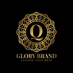 letter Q glory mandala vintage golden color luxury vector logo design