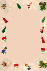 decorations background with copy space text, festive holidays flat lay with zero waste gift fir branches and cone, wooden small christmas tree .