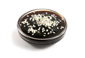 bowl of unaggi sauce with sesame seeds