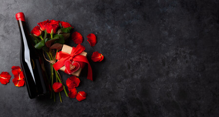 Champagne bottle and rose flowers