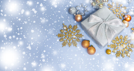 Silver gold Christmas gifts with snow background. silver decorations on pastel silver background....