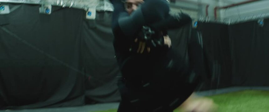 Actors wearing motion capture suits performing some fight moves as game characters. Motion capture is an unparalleled method for making animated characters move more realistically