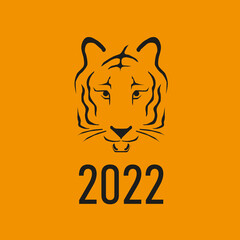 2022 year of the tiger. Tiger head silhouette. Tiger head icon on orange background. Vector illustration