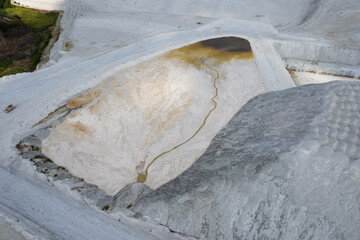 Aerial sunny view of phosphogypsum mountains in Kėdainiai city, industrial area, Lithuania