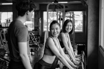 asia group friends working out or exercise and wearing sportswear in fitness or gym center, strength sporty and weight loss concept