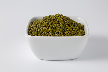 mung bean in bowl on white background studio shot
