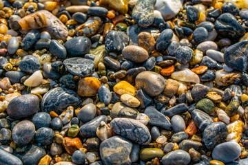 abstract background with round pebble stones. Vacation holiday recreation on beach concept. High quality photo