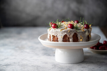 Christmas cake with fresh cranberries.