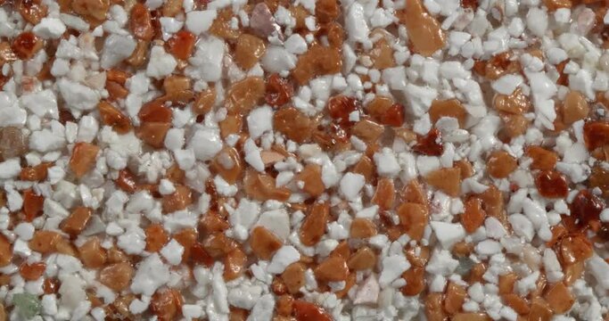 Close-up texture of fine marble chips.