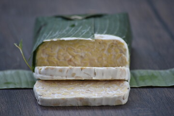 Tempeh or tempe is a traditional Javanese food made from fermented soybeans and made by a natural...