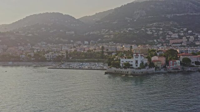 Saint Jean Cap Ferrat France Aerial v15 cinematic establishing shot drone flying toward the shore capturing greek villa kerylos, port fourmis and beach - July 2021