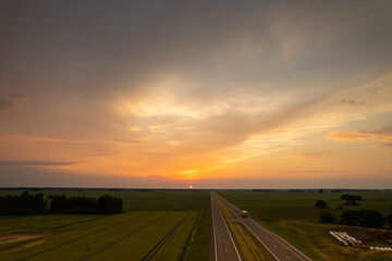 Aerial summer evening stormy view of highway road, before the storm