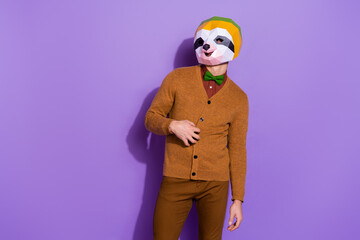 Photo of young guy hand on stomach wish want to eat hunger authentic red panda isolated over violet color background © deagreez