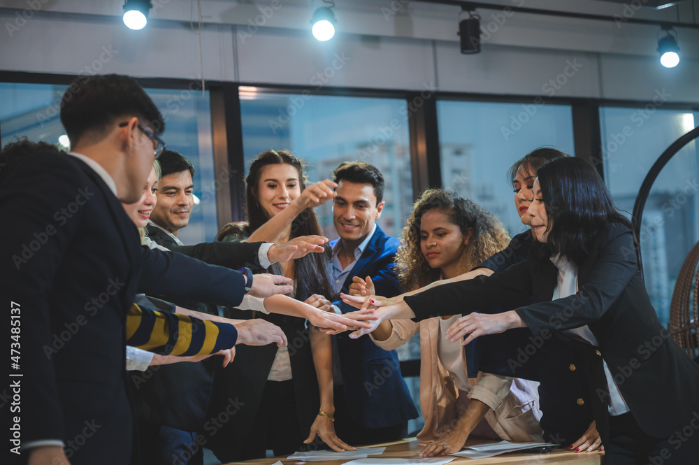 Wall mural Happy Adult Business people team men and women celebrate new year meeting for successful company.