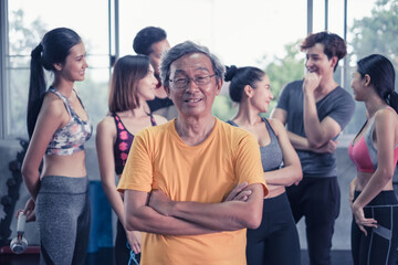Senior man and young group people, Friends different ages in gym working out