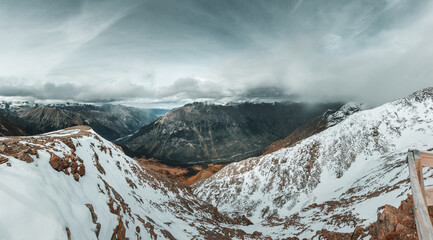 Fototapeta na wymiar Snowy mountains / Panoramic view of the winter mountains