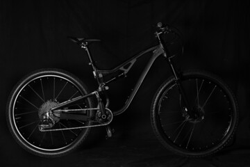 close up of mountain bicycle isolated on black
