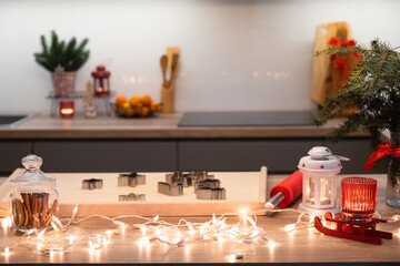 Christmas festively decorated kitchen with christmas lights, and cookie cutters