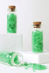 Aromatic crystals of sea salt. Spa composition with cosmetic bathroom product front view, minimal trend.