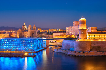 Marseille Old Port and Fort Saint-Jean in night. France