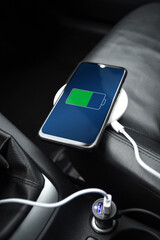Mobile phone ,smartphone, cellphone is charged ,charge battery with usb charger in the inside of...