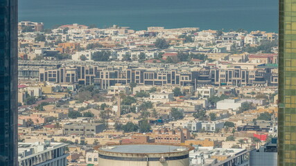 Aerial view of apartment houses and villas in Dubai city timelapse, United Arab Emirates