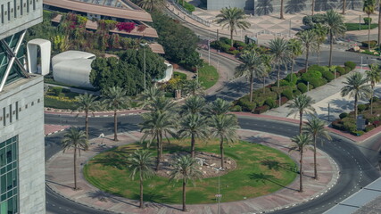 Aerial view of a roundabout circle road in Dubai financial district from above timelapse. © HyperlapsePro
