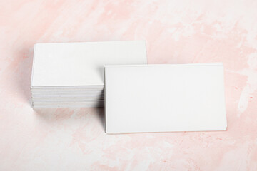 Business cards blank mockup on pink marble background mockup for design