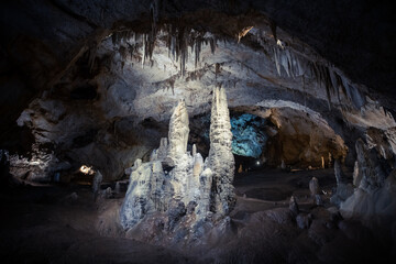 Giant stalagmite in a an underground cave