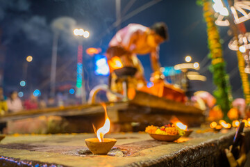 Ganga aarti ceremony rituals were performed by Hindu priests at Dashashwamedh Ghat and Assi Ghat in Varanasi Uttar Pradesh India - obrazy, fototapety, plakaty
