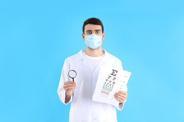 Fototapeta na wymiar Eye doctor on blue background, healthcare concept