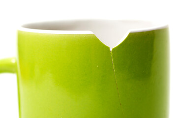 Broken mug with its crack.