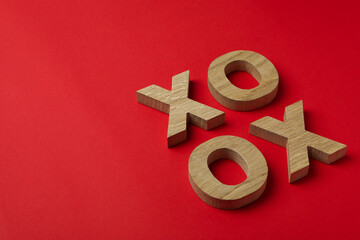 Valentine's Day concept with XO letters on red background