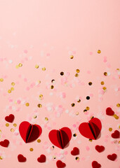 Red paper shape hearts and confetti valentine and mothers day concept