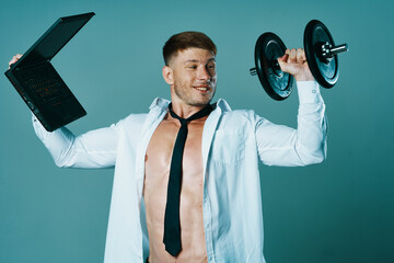 a man in a shirt with a pumped-up body laptop dumbbells business office