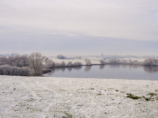 First wonters snow at Pickmere Lake, Pickmere, Knutsford, Cheshire, UK