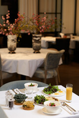 Restaurant breakfast table served with food