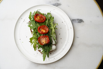 Traditional italian bruschetta with roasted tomatoes